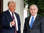FILE PHOTO: U.S. President Donald Trump gives a thumbs up as he welcomes Israeli Prime Minister Benjamin Netanyahu at the White House in Washington, D.C., U.S., September 29, 2025. REUTERS/Kevin Lamarque/File Photo