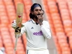 KL Rahul celebrates his century during the second day of the first Test between India and West Indies at the Narendra Modi Stadium.