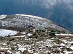 Upper reaches of Gulmarg receive season's first snowfall, in Baramulla, on Friday. (ANI) Upper reaches of Gulmarg receive season's first snowfall, in Baramulla, on Friday. (ANI)