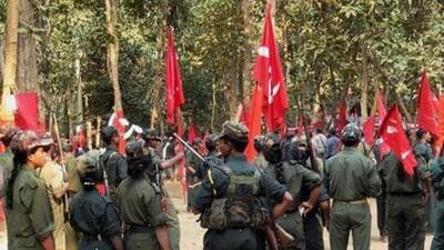 A gathering of CPI (Maoist) cadres in Chhattisgarh. (PTI File Photo) A gathering of CPI (Maoist) cadres in Chhattisgarh. (PTI File Photo)