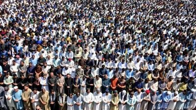 Activists of Awami Action Committee (AAC) attend the funeral prayers for protesters who were allegedly killed by security personnel, during a demonstration in Muzaffarabad, capital of PoK on October 2 (AFP) Activists of Awami Action Committee (AAC) attend the funeral prayers for protesters who were allegedly killed by security personnel, during a demonstration in Muzaffarabad, capital of PoK on October 2 (AFP)