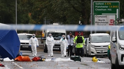 Police shot and killed a suspect seven minutes after he rammed a car into pedestrians outside the synagogue on Thursday morning and then attacked them with a knife. (Reuters)