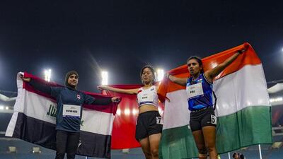 China’s Qianqian Guo (centre) Iraq’s Fatimah Suwaed and India’s Preeti Pal (right) on the podium in women's 200m T35 event. (PTI) China’s Qianqian Guo (centre) Iraq’s Fatimah Suwaed and India’s Preeti Pal (right) on the podium in women's 200m T35 event. (PTI)