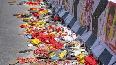 Footwear and other belongings of people lie on a road in the aftermath of stampede. (PTI photo) Footwear and other belongings of people lie on a road in the aftermath of stampede. (PTI photo)