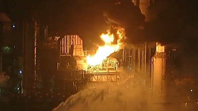 This image taken from video by ABC7 shows flames rising from the Chevron refinery in El Segundo, Calif., Thursday, Oct. 2, 2025. (AP) This image taken from video by ABC7 shows flames rising from the Chevron refinery in El Segundo, Calif., Thursday, Oct. 2, 2025. (AP)