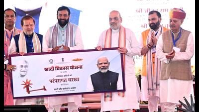 Union home minister Amit Shah along with on Haryana CM Nayab Singh Saini and other party workers in Rohtak on Friday. (Manoj Dhaka/HT) Union home minister Amit Shah along with on Haryana CM Nayab Singh Saini and other party workers in Rohtak on Friday. (Manoj Dhaka/HT)