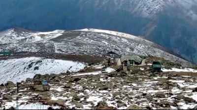 Upper reaches of Gulmarg receive season's first snowfall, in Baramulla, on Friday. (ANI) Upper reaches of Gulmarg receive season's first snowfall, in Baramulla, on Friday. (ANI)