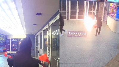 Film.ca cinemas said two masked suspect carrying red gas cans set fire to the entrance doors of the theatre. (X/@FilmCaCinemas) Film.ca cinemas said two masked suspect carrying red gas cans set fire to the entrance doors of the theatre. (X/@FilmCaCinemas)