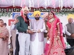 Blessing newly-wedded couples at an event, Chief minister Bhagwant Singh Mann said that a successful marital life is founded on mutual trust and balance. He also distributed cheques as shagun to newly-wed couples. (HT Photo) Blessing newly-wedded couples at an event, Chief minister Bhagwant Singh Mann said that a successful marital life is founded on mutual trust and balance. He also distributed cheques as shagun to newly-wed couples. (HT Photo)