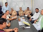 Senior deputy mayor Rakesh Parashar (right), along with officials of MC and traffic police, during a meeting with members of market associations in Ludhiana on Friday. (HT Photo) Senior deputy mayor Rakesh Parashar (right), along with officials of MC and traffic police, during a meeting with members of market associations in Ludhiana on Friday. (HT Photo)