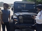 The Panchkula police impounded the vehicle near the Chandimandir toll plaza after finding multiple violations and issued a fine of a whopping <span class='webrupee'>₹</span>42,500. (HT File) The Panchkula police impounded the vehicle near the Chandimandir toll plaza after finding multiple violations and issued a fine of a whopping <span class='webrupee'>₹</span>42,500. (HT File)