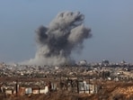 This picture taken during a media tour organised by the Israeli army on October 3, 2025, shows a plume of smoke rising above Gaza City during an Israeli strike. This picture taken during a media tour organised by the Israeli army on October 3, 2025, shows a plume of smoke rising above Gaza City during an Israeli strike.