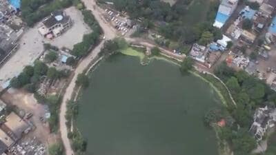 Basai pond in Gurugram where encroachments have been seen. (HT) Basai pond in Gurugram where encroachments have been seen. (HT)