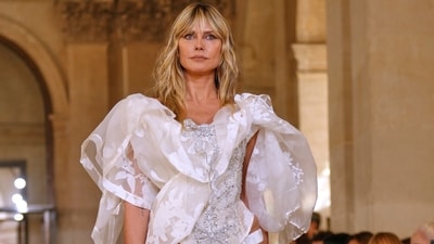 Heidi Klum wears a creation as part of the Vivienne Westwood Spring/Summer 2026 collection presented in Paris on October 4. (AP) Heidi Klum wears a creation as part of the Vivienne Westwood Spring/Summer 2026 collection presented in Paris on October 4. (AP)