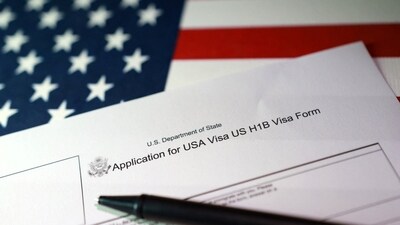 After Donald Trump announced the $100,000 fee, several major companies urged employees holding the H-1B visa not to leave the US. (Reuters)