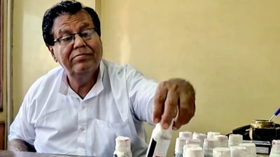 *An official looks at bottles of the Coldrif cough syrup after a raid by the Drug and Pharmaceuticals Department officials at Kataria Pharmaceuticals, after the deaths of 11 children, nine in Madhya Pradesh and two in Rajasthan, allegedly linked to contaminated cough syrup. (PTI) *An official looks at bottles of the Coldrif cough syrup after a raid by the Drug and Pharmaceuticals Department officials at Kataria Pharmaceuticals, after the deaths of 11 children, nine in Madhya Pradesh and two in Rajasthan, allegedly linked to contaminated cough syrup. (PTI)