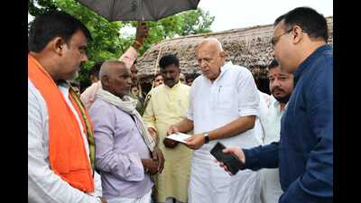 Surya Pratap Shahi presenting the approval letter for the relief amount to the affected family. (HT PHOTO) Surya Pratap Shahi presenting the approval letter for the relief amount to the affected family. (HT PHOTO)