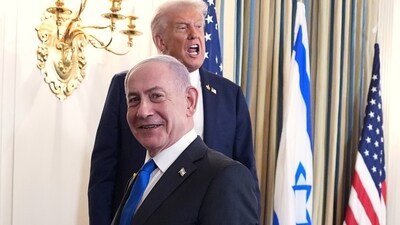 President Donald Trump speaks upon departing a news conference with Israeli Prime Minister Benjamin Netanyahu, in foreground, in the State Dining Room of the White House, Monday, Sept 29 (AP) President Donald Trump speaks upon departing a news conference with Israeli Prime Minister Benjamin Netanyahu, in foreground, in the State Dining Room of the White House, Monday, Sept 29 (AP)