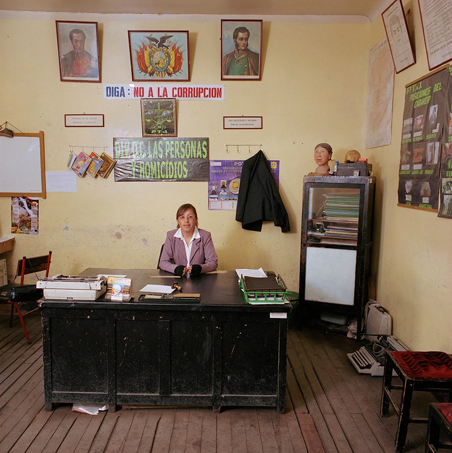 Marlene Abigahit Choque, a detective with the Potosi police department in Bolivia. When Banning visited, conditions were so poor that some police personnel had to use public buses, in the absence of official cars or motorcycles. Offices held broken typewriters, no computers, no copy machines, not even telephones. . (Jan Banning)