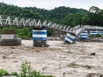 A view of portion of the Dudhia iron bridge, collapsed due to heavy rain in Darjeeling on Sunday.