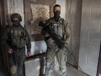 Israeli army soldiers inside a building in the vicinity of the Jordanian Field Hospital in Gaza City. Israeli army soldiers inside a building in the vicinity of the Jordanian Field Hospital in Gaza City.