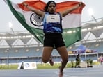 India’s Priti Pal celebrates after winning the silver medal in the women’s 100m in the World Para Athletics Championships in New Delhi on Sunday. (REUTERS)