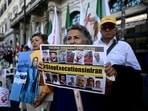 Protesters hold a placard against executions in Iran during a rally against the Iranian regime in Rome. Protesters hold a placard against executions in Iran during a rally against the Iranian regime in Rome.