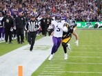 Minnesota Vikings wide receiver Jordan Addison (3) runs for a gain past Pittsburgh Steelers linebacker Payton Wilson (41) 
