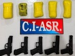 The Counter Intelligence (CI), Amritsar, has busted a cross-border arms and narcotics smuggling module with links to Pakistan with the arrest of two of its operatives and recovered 2.5 kg heroin and five sophisticated pistols from their possession, said director general of police (DGP), Punjab, Gaurav Yadav, here on Sunday. (HT Photo) The Counter Intelligence (CI), Amritsar, has busted a cross-border arms and narcotics smuggling module with links to Pakistan with the arrest of two of its operatives and recovered 2.5 kg heroin and five sophisticated pistols from their possession, said director general of police (DGP), Punjab, Gaurav Yadav, here on Sunday. (HT Photo)