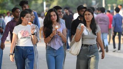 As the mercury shot up, visitors were seen enjoying ice-creams at Sukhna Lake in Chandigarh on Sunday. (Keshav Singh/HT) As the mercury shot up, visitors were seen enjoying ice-creams at Sukhna Lake in Chandigarh on Sunday. (Keshav Singh/HT)