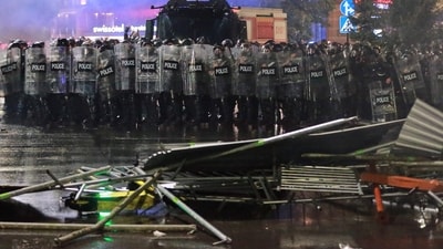 Police block a street to prevent demonstrators from advancing during an opposition rally in the city center of Tbilisi, Georgia, on Saturday, Oct. 4, 2025/ (AP) Police block a street to prevent demonstrators from advancing during an opposition rally in the city center of Tbilisi, Georgia, on Saturday, Oct. 4, 2025/ (AP)