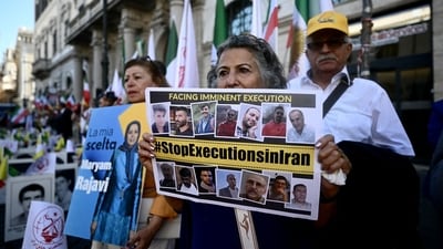 Protesters hold a placard against executions in Iran during a rally against the Iranian regime in Rome. (AFP) Protesters hold a placard against executions in Iran during a rally against the Iranian regime in Rome. (AFP)