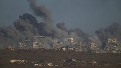 Smoke billows over Gaza Strip following an Israeli bombardment, as seen from southern Israel. (AP) Smoke billows over Gaza Strip following an Israeli bombardment, as seen from southern Israel. (AP)