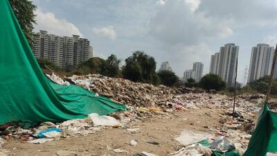 Locals allege that the waste has been accumulating for over a year, transforming the area into a massive dump yard, severely affecting thousands of locals living nearby. Locals allege that the waste has been accumulating for over a year, transforming the area into a massive dump yard, severely affecting thousands of locals living nearby.