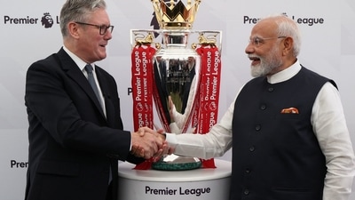 Indian PM Narendra Modi and his British PM Keir Starmer strike a pose with the Premier League football championship trophy during Modi's visit to the UK earlier this year. Starmer is scheduled to arrive in India later this week. (X/@NarendraModi) Indian PM Narendra Modi and his British PM Keir Starmer strike a pose with the Premier League football championship trophy during Modi's visit to the UK earlier this year. Starmer is scheduled to arrive in India later this week. (X/@NarendraModi)