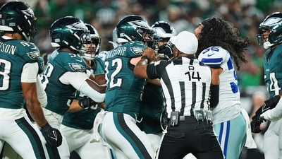 Philadelphia Eagles safety Reed Blankenship (32) and Dallas Cowboys' Marist Liufau, right, are separated by referee Shawn Smith (14) (AP) Philadelphia Eagles safety Reed Blankenship (32) and Dallas Cowboys' Marist Liufau, right, are separated by referee Shawn Smith (14) (AP)