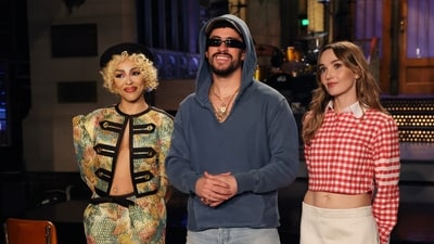Bad Bunny, center, with musical guest Doja Cat, left, and cast member Chloe Fineman (AP) Bad Bunny, center, with musical guest Doja Cat, left, and cast member Chloe Fineman (AP)