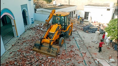The Ghausulbara mosque being demolished at Raya Buzurg village under Asmoli Police Station in Sambhal district (PTI) The Ghausulbara mosque being demolished at Raya Buzurg village under Asmoli Police Station in Sambhal district (PTI)