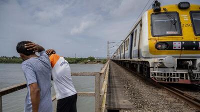 The bridge has seven poles with buffer areas for railway workers to take shelter when trains pass by. Villagers rush to one of these when local trains approach, cover their heads with their hands, and face away from the tracks. (Satish Bate/ Hindustan Times) The bridge has seven poles with buffer areas for railway workers to take shelter when trains pass by. Villagers rush to one of these when local trains approach, cover their heads with their hands, and face away from the tracks. (Satish Bate/ Hindustan Times)