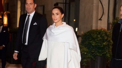 Meghan Markle went with a single gold necklace and small diamond earrings, and chose to wear her hair in a sleek low bun to finish off the look. (X/@beyzanurapaydin) Meghan Markle went with a single gold necklace and small diamond earrings, and chose to wear her hair in a sleek low bun to finish off the look. (X/@beyzanurapaydin)