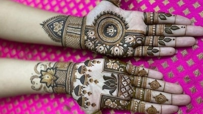 Falling on October 9 and 10 this year, the festival coincides with the fourth day after the full moon in the Hindu month of Kartik. The mehendi pattern reflects floral motifs, intertwined with leaves and lotuses. (instagram/@3d_henna_touch) Falling on October 9 and 10 this year, the festival coincides with the fourth day after the full moon in the Hindu month of Kartik. The mehendi pattern reflects floral motifs, intertwined with leaves and lotuses. (instagram/@3d_henna_touch)