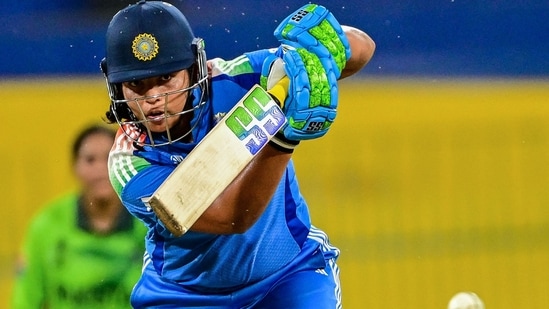 Richa Ghosh led a much-needed late recovery with a brisk 35 before India were bowled out for 247 against Pakistan on a slow track.(AFP)