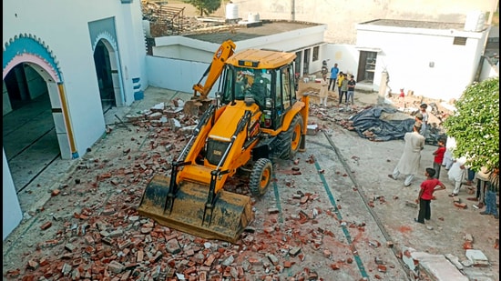 The Ghausulbara mosque being demolished at Raya Buzurg village under Asmoli Police Station in Sambhal district (PTI)