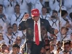 President Donald Trump goes viral for YMCA dance at Virginia Navy event (Photo by Alex WROBLEWSKI / AFP)