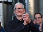 Apple CEO Tim Cook joins Apple employees at the Apple store as customers line up for the release of Apple new iPhone 17 models in New York.