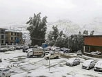 Vehicles covered in fresh snowfall, in Keylong, on Monday. (PTI) Vehicles covered in fresh snowfall, in Keylong, on Monday. (PTI)