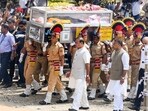 Assam Chief Minister Himanta Biswa Sarma walks next to Zubeen Garg's coffin at his funeral procession in Sonarpur, in the outskirts of Guwahati on Tuesday. Assam Chief Minister Himanta Biswa Sarma walks next to Zubeen Garg's coffin at his funeral procession in Sonarpur, in the outskirts of Guwahati on Tuesday.