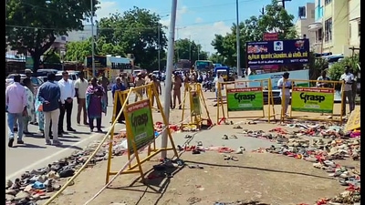 A special investigation team led by Inspector General of Police (North Zone) Asra Garg visits the Karur stampede spot to probe into the incident on Sunday. (ANI Video Grab) A special investigation team led by Inspector General of Police (North Zone) Asra Garg visits the Karur stampede spot to probe into the incident on Sunday. (ANI Video Grab)