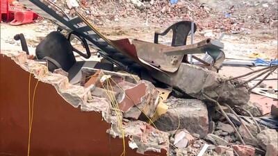 A view of a demolished structure after Nagar Nigam conducts an anti-encroachment drive following violence, in Bareilly on Monday. (ANI Video Grab)
