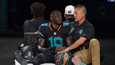 Miami Dolphins wide receiver Tyreek Hill (10) talks with a staff member as he is carted off the field. (AP) Miami Dolphins wide receiver Tyreek Hill (10) talks with a staff member as he is carted off the field. (AP)